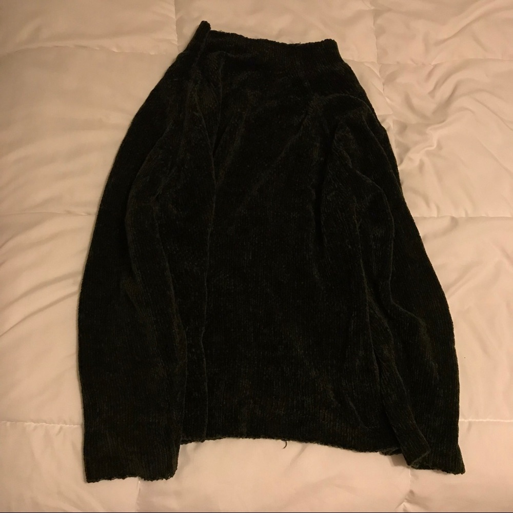 Carolyn Taylor green sweater